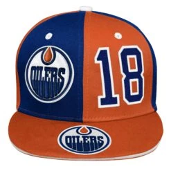 NEW ERA Youth Edmonton Oilers Zach Hyman Pandemonium Snapback Hat – Blue/Orange